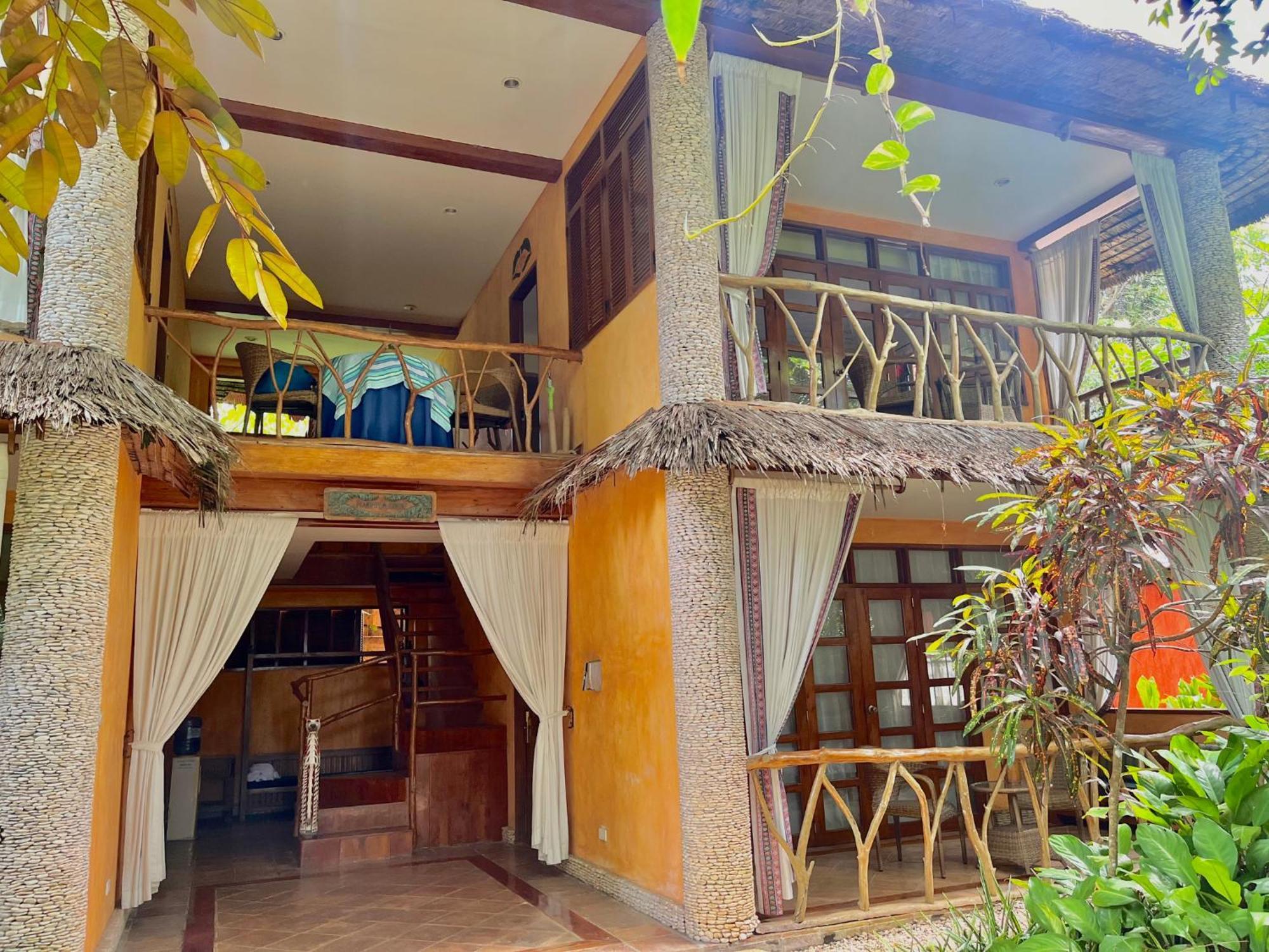 Coco Grove Beach Resort, Siquijor Island Luaran gambar A villa at the resort