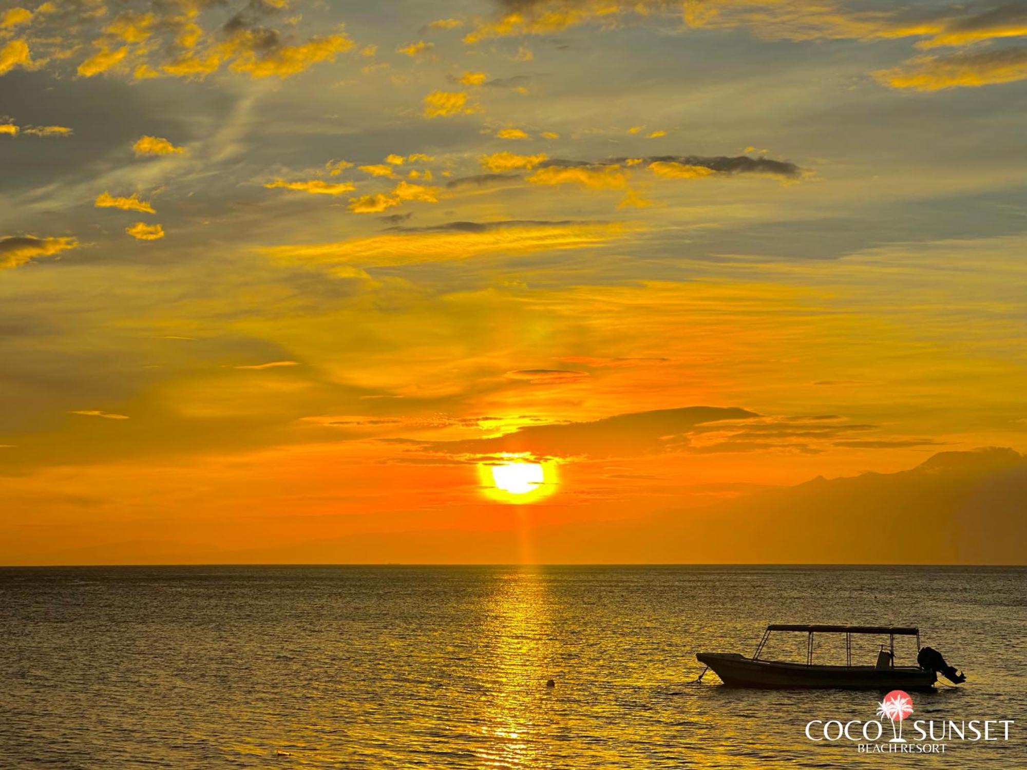 Coco Grove Beach Resort, Siquijor Island Luaran gambar Sunset at Ooboi